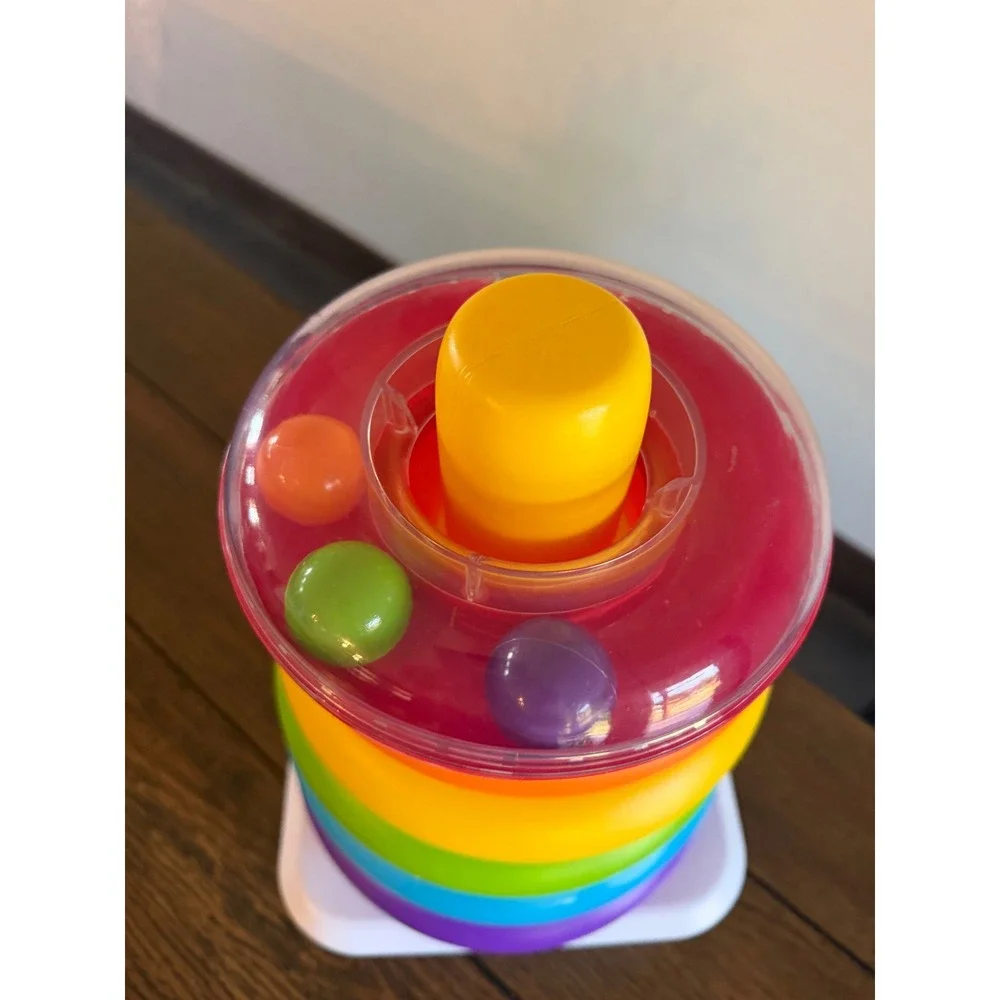 Fisher-Price Rock-a-Stack Rainbow Ring Stacker Baby Toy with Rattle Beads